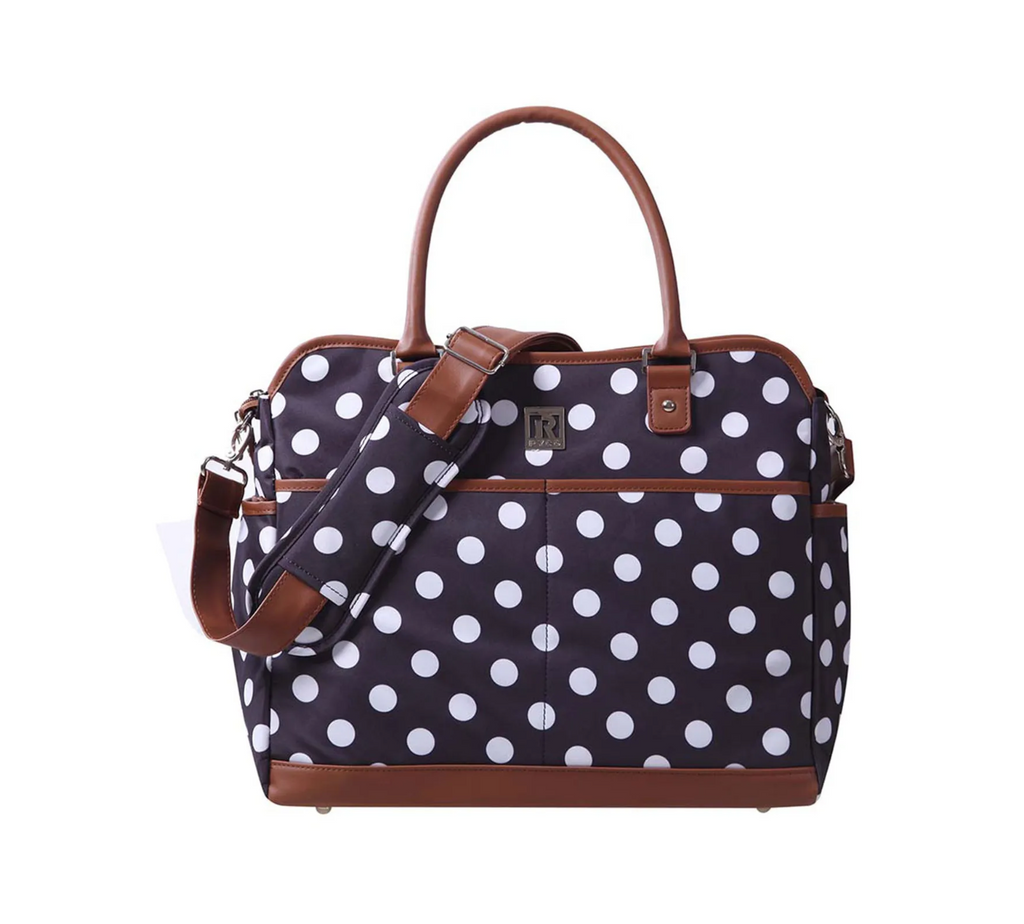 Polka dot handbag with brown accents on a white background
